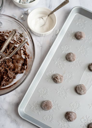 Easy Cake Mix Kiss Cookies - Cake mix balls placed on a baking sheet