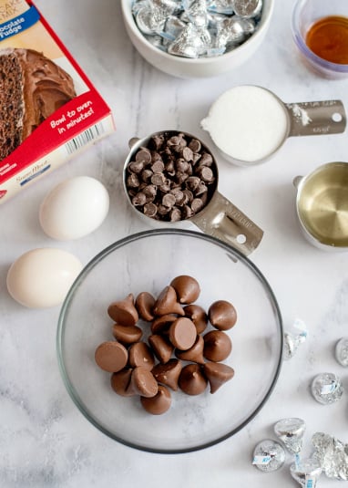 Easy Cake Mix Kiss Cookies - Chocolate kisses in a glass bowl