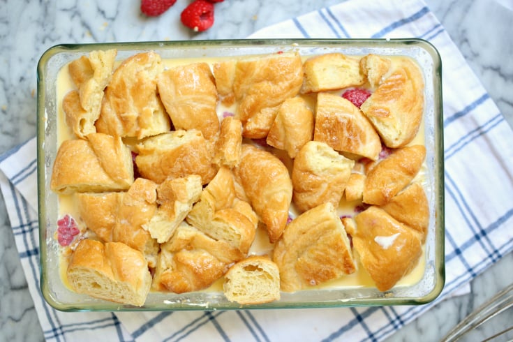 Raspberry Cheesecake Breakfast Bake - Second layer of bread pieces and egg mixture poured into baking dish