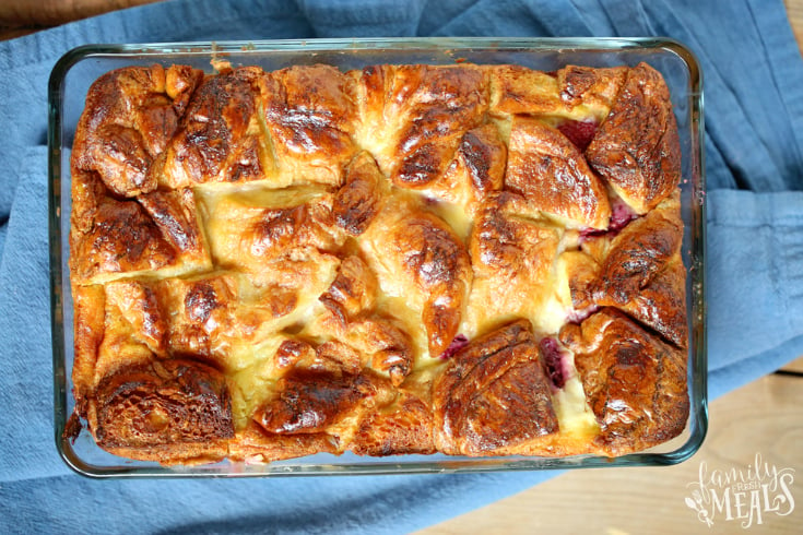 Raspberry Cheesecake Breakfast Bake - cooked casserole, cooling on a blue towel