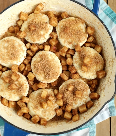 Skillet Apple Pie Dessert Biscuits - biscuits topped with diced apples, cinnamon sugar