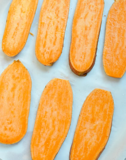 Sweet Potato Toast Casserole - sliced sweet potato on a baking sheet