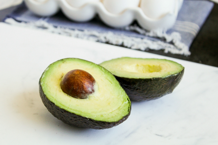 Avocado Egg Bites - Avocado sliced in half- Family Fresh Meals