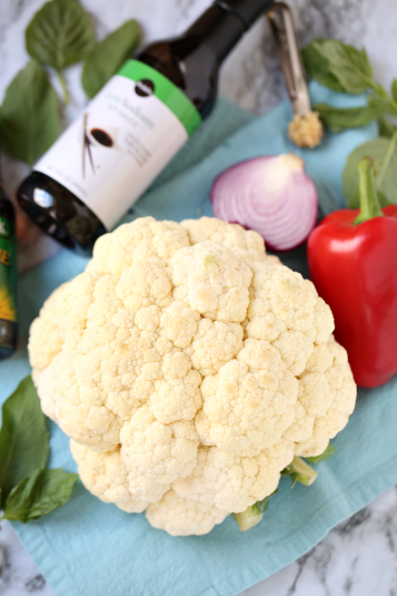 Thai Basil Cauliflower Rice ingredients_ cauliflower head, bell pepper, onion, seasonings