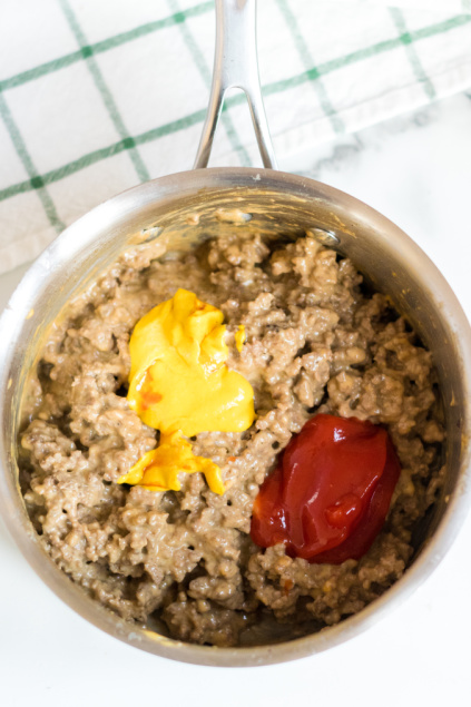 Bacon Cheeseburger Dip - Adding in ketchup and mustard to cheesy ground beef