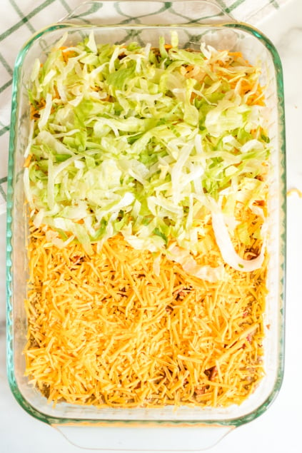 Bacon Cheeseburger Dip - Shredded cheese and shredded lettuce added to top of casserole