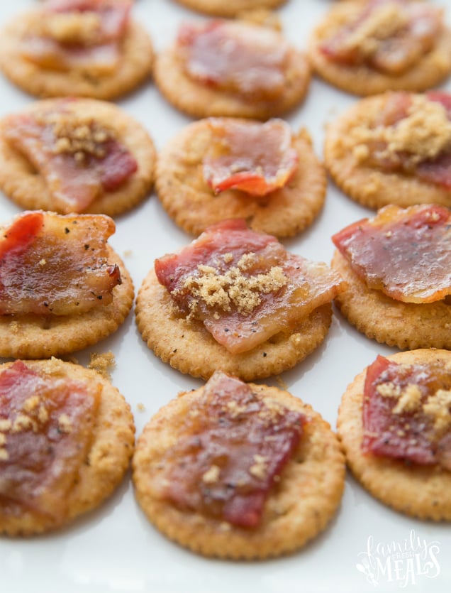 Candied Bacon Cracker Appetizers laid out on a white plate
