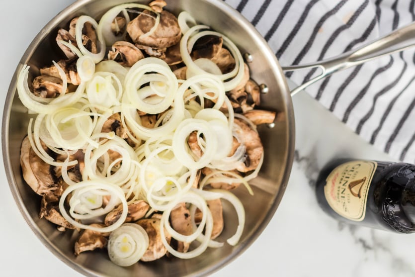 Cheesy Guinness Beef Sliders - cooking onions and mushrooms in a pan - Family Fresh Meals