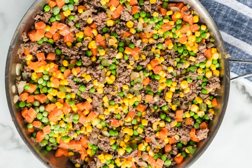 Easy Shepherds Pie Recipe - browned beef and vegetables in a pan