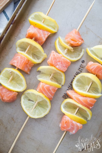 Lemon Salmon Kabobs - Salmon kabob on a baking sheet - Family Fresh Meals