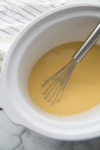 The Best Crockpot Chicken and Gravy - gravy sauce in slow cooker