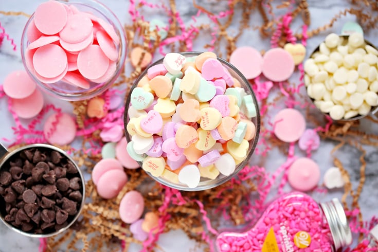 Valentine's Day Chocolate Bark - Conversation hearts in a small bowl, and chocolate chips