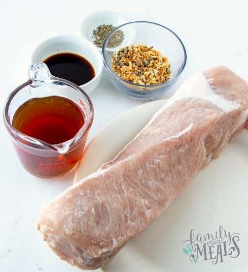 Easy Crockpot Pork Loin - Ingredients pork loin, onions soup mix, broth, Worcestershire sauce, and seasoning - Family Fresh Meals