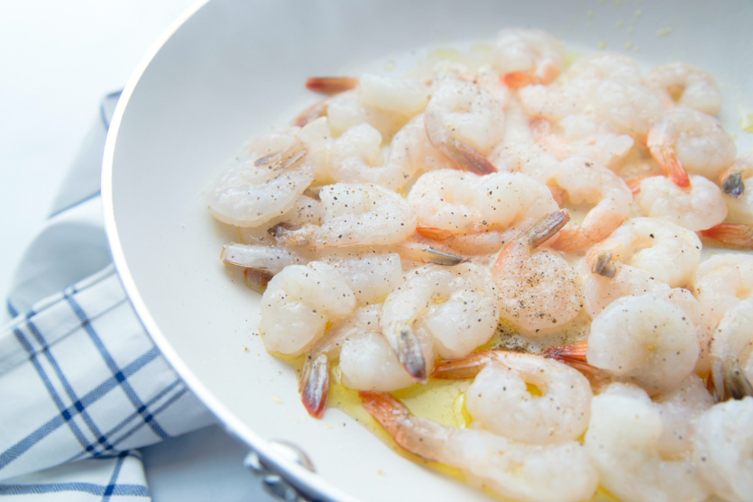 Easy Coconut Shrimp - shrimp cooking in a pan - Family Fresh Meals jpg