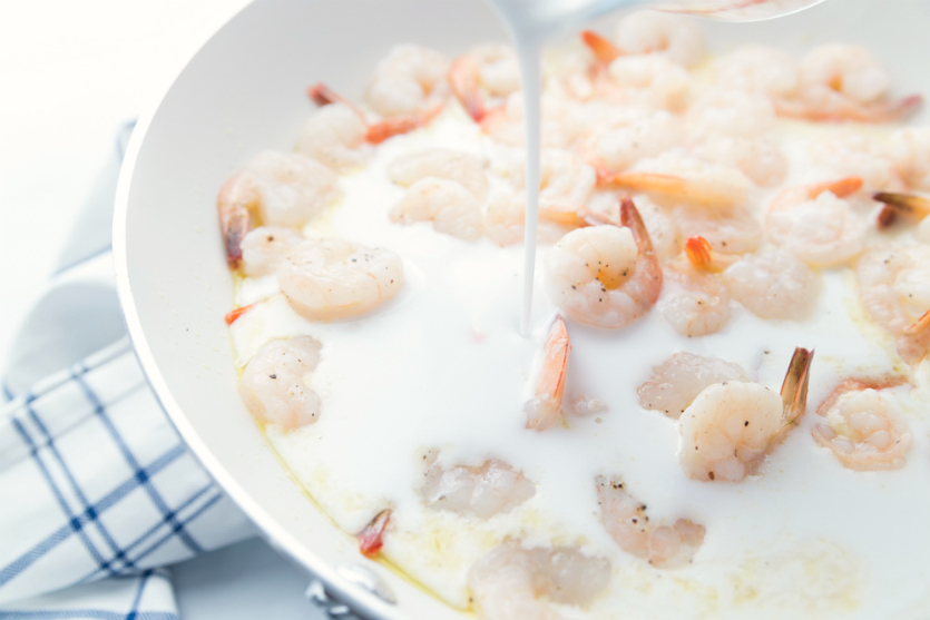 Easy Coconut Shrimp - shrimp cooking in coconut milk - Family Fresh Meals jpg