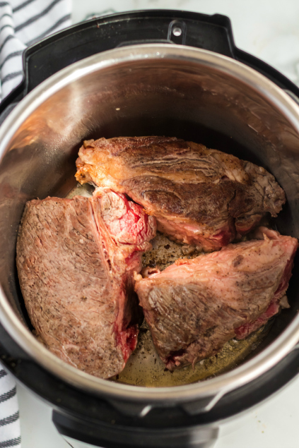 Instant Pot Pot Roast Dinner - meat browned in instant pot - Family Fresh Meals