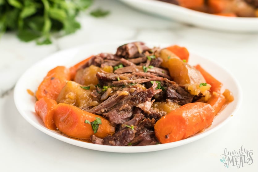 Instant Pot Pot Roast Dinner - served on a white plate - Family Fresh Meals