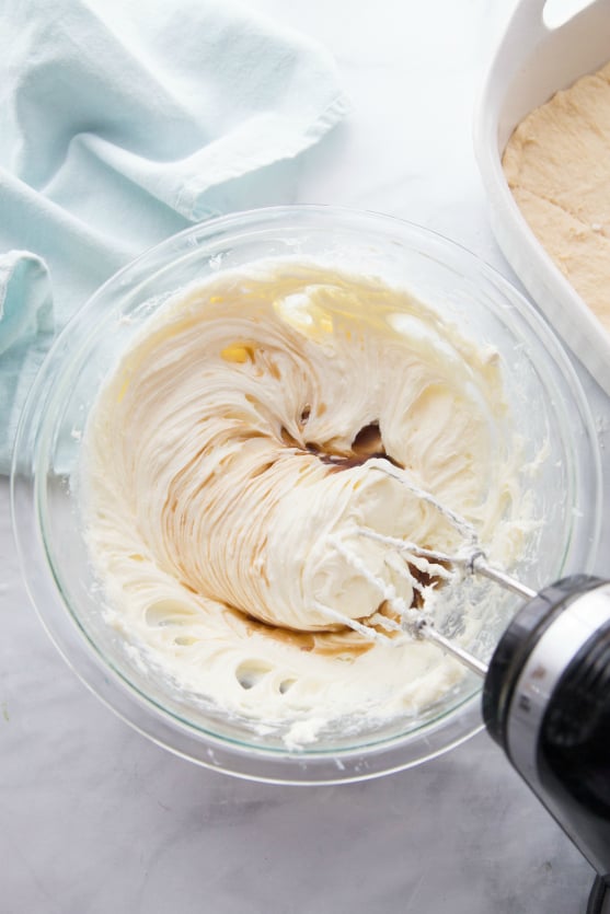 Churro Cheesecake Bars - Mixing cream cheese mixture with hand mixer - Family Fresh Meals