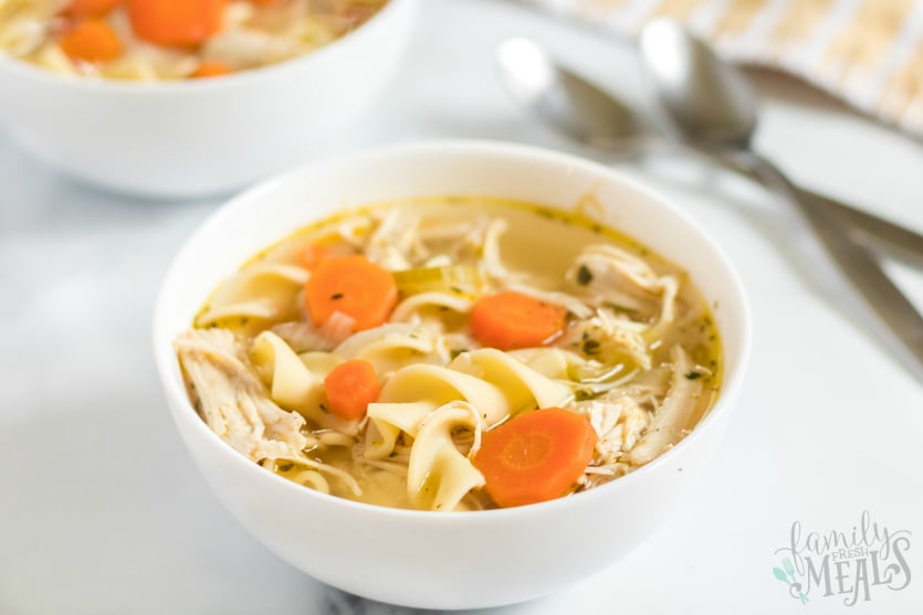 Instant Pot Chicken Noodle Soup served in a white bowl