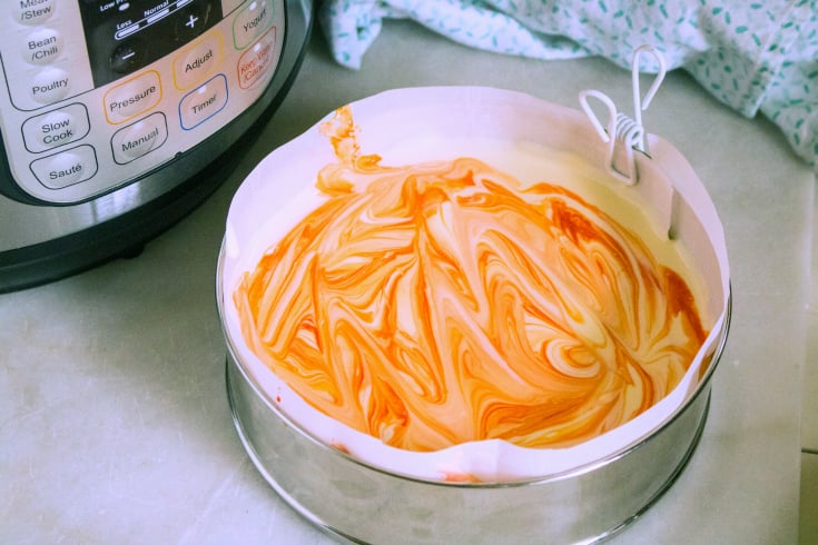 Instant Pot Orange Creamsicle Cheesecake - Cheesecake batter in spring form pan