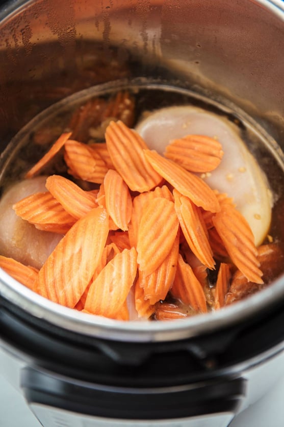 Instant Pot Teriyaki Chicken - sliced carrots on top of chicken