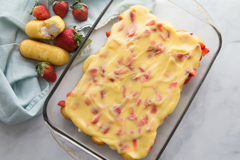 No Bake Strawberry Twinkie Cake - Pudding spread over strawberries - Family Fresh Meals