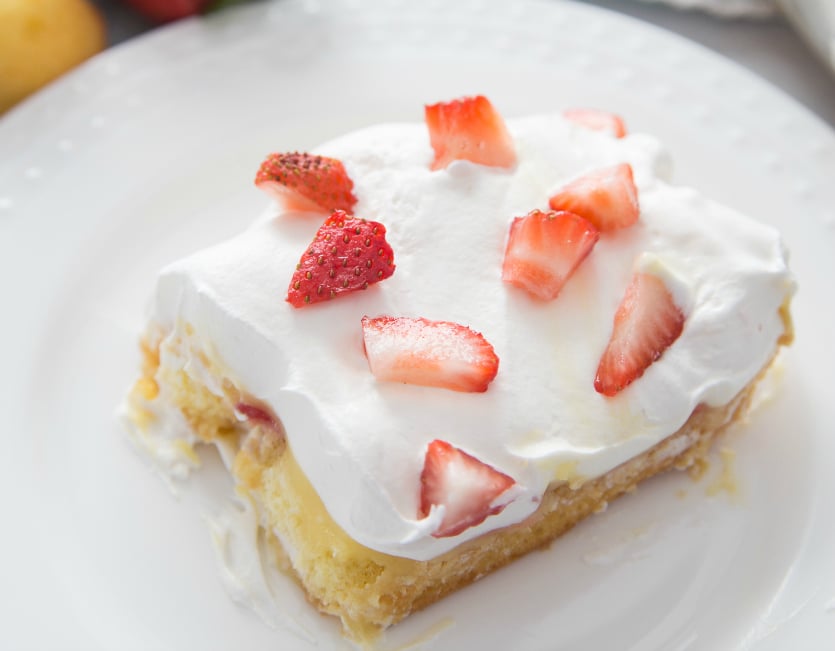 No Bake Strawberry Twinkie Cake - Slice of cake on white plate