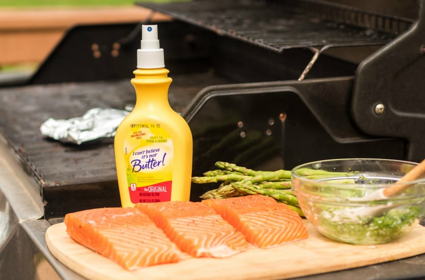 Asparagus Salmon Foil Packets - ICBINB spray, salmon, asparagus on cutting board