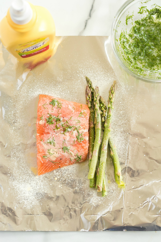 Asparagus Salmon Foil Packets - Salmon, asparagus on foil and sprayed with ICBINB