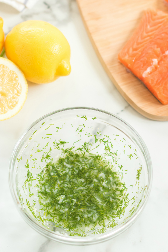 Asparagus Salmon Foil Packets - dill, lemon, garlic mixture in bowl