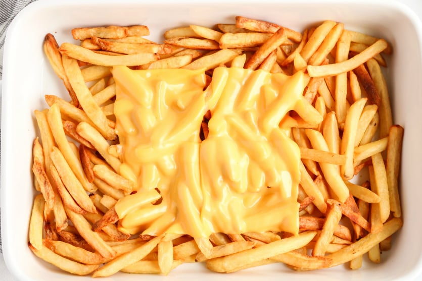 Copycat In N Out Animal Fries - Cheese slices melted on top of cheese