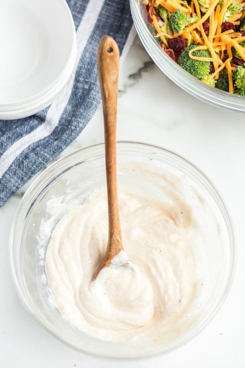 Creamy Broccoli Salad - creamy dressing in a small mixing bowl