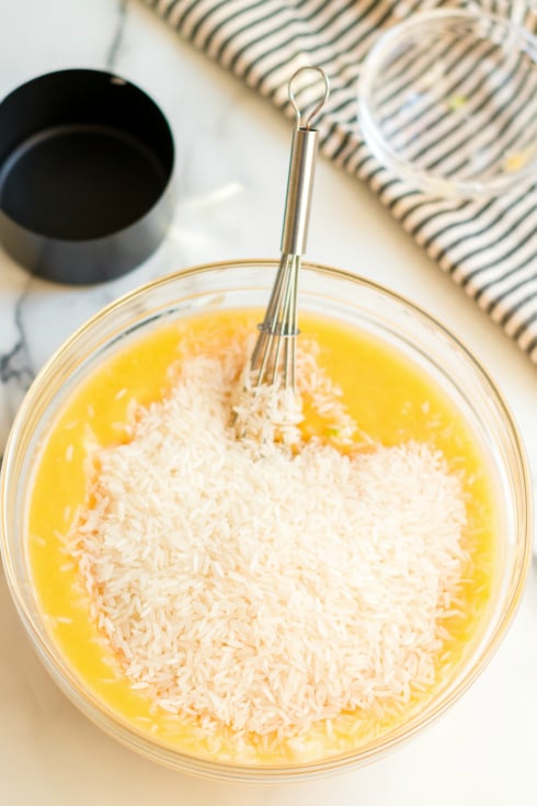 Crockpot Creamy Chicken and Rice - rice being mixed into creamy mixture