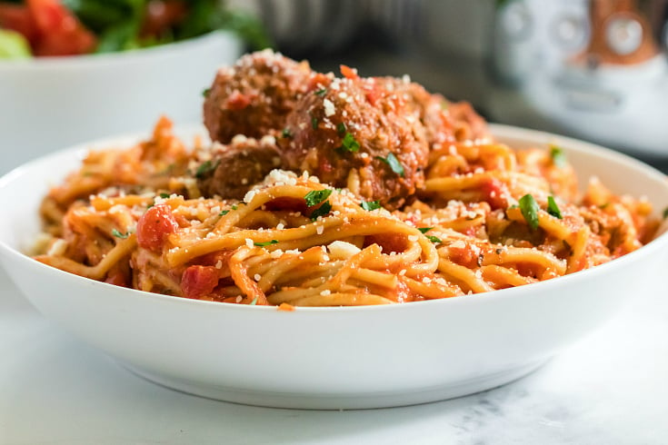 Crockpot Spaghetti and Meatballs served in a white bowl