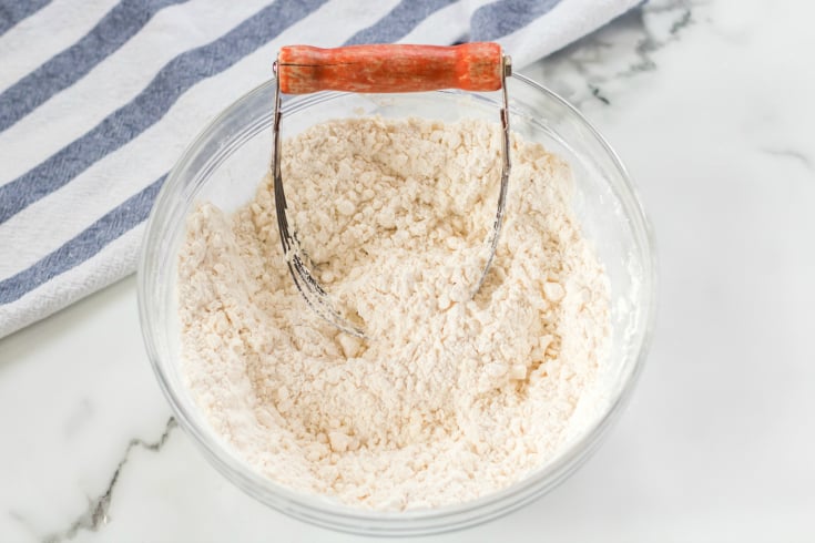 Easy Homemade Biscuits - butter cut into flouring, in a glass bowl