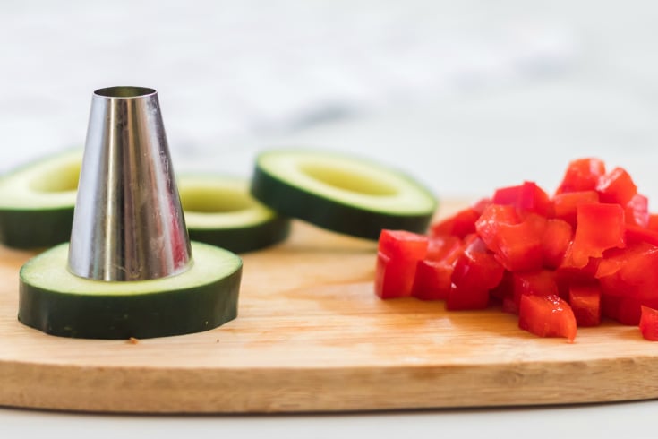 Cucumber Sushi Lunch Box Idea - cutting the centers out of cucumber