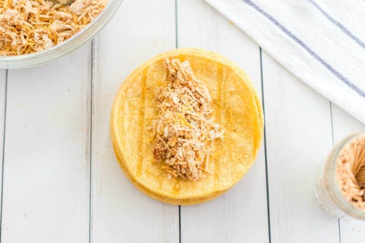 Easy Chicken Taquitos - Shredded chicken mix on corn tortilla