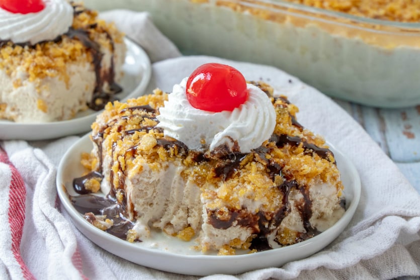 Fried Ice Cream Cake - slice of cake on a plate with a piece cut out