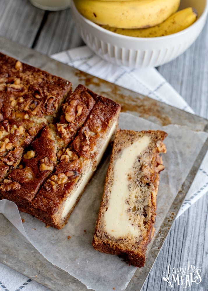 Cream Cheese Banana Bread - Banana bread sliced on a baking sheet