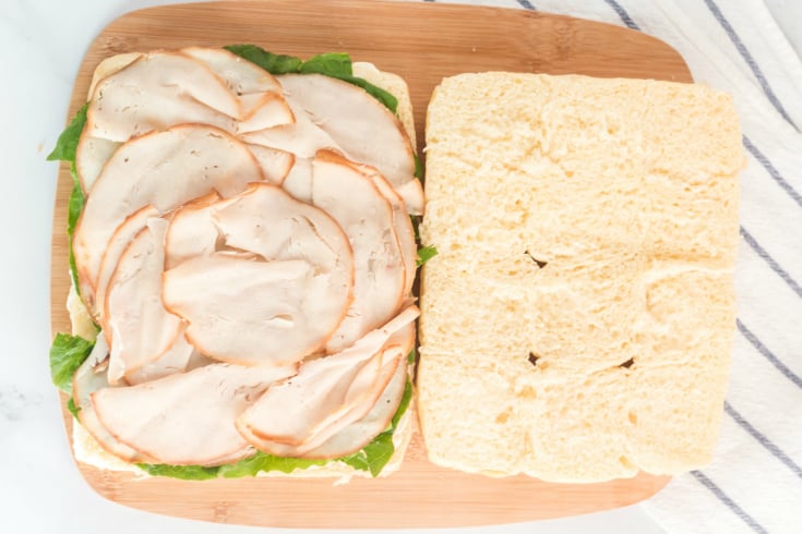 Mini Sliders Lunchbox Idea - Mayo, lettuce and meat added to Hawaiian rolls