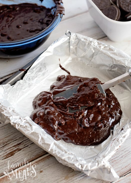 Oreo Stuffed Brownies - Placing brownie batter into baking pan