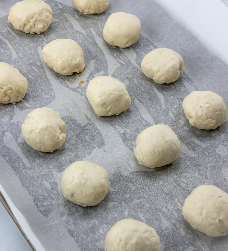 Cheesy Pizza Bombs - raw pizza balls on baking sheet