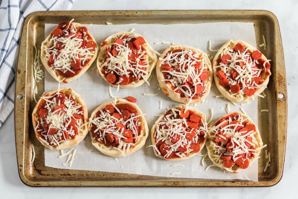 English Muffin Pizza Lunchbox Idea - English muffin pizzas on baking sheet