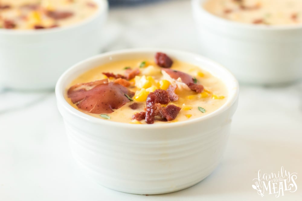 Instant Pot Potato Corn Chowder Recipe - Family Fresh Meals - served in a white bowl