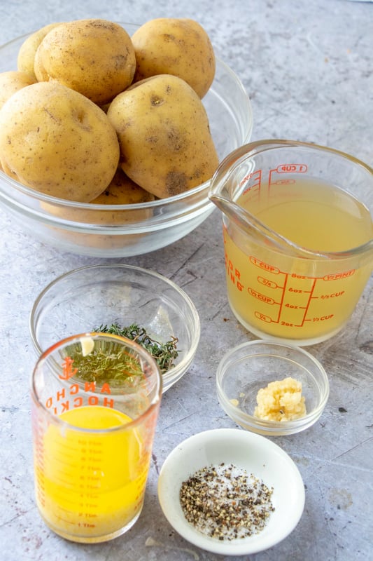 Melting Potatoes Ingredients - potatoes, broth, seasoning, garlic, and butter