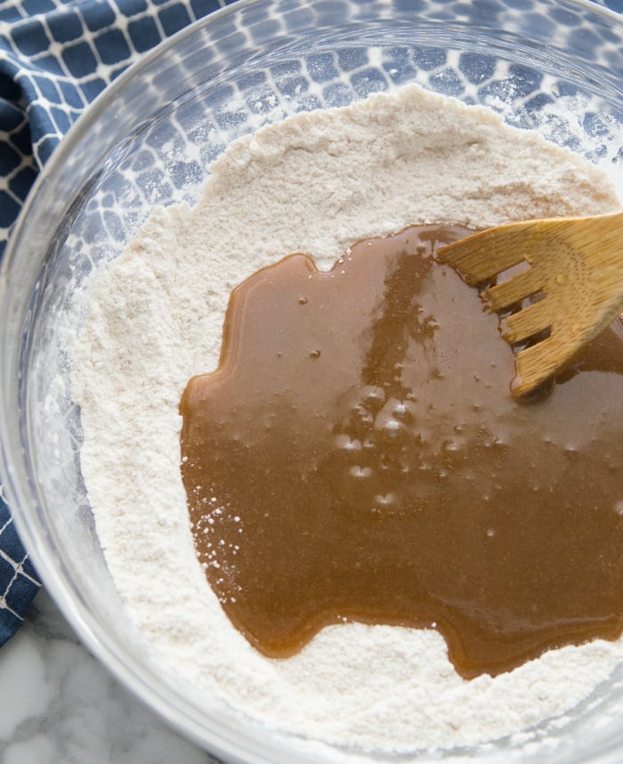 Soft Brown Sugar Cookies - Flour mixture and browned butter mixture in mixing bowl