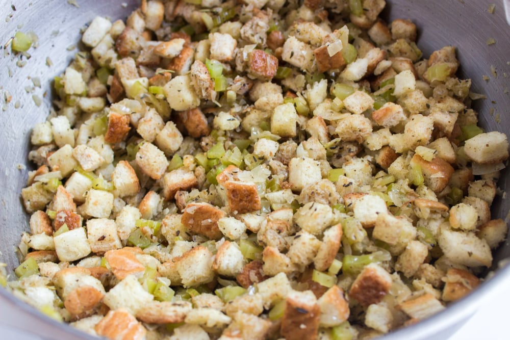 Easy Crockpot Stuffing - bread cubes mixed in the sauted vegetables