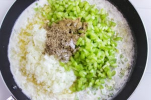 Easy Crockpot Stuffing - onions, celery and seasoning cooking in butter