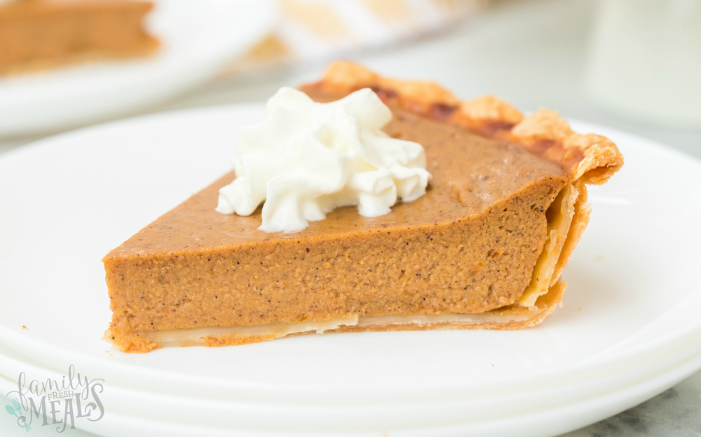 Easy Pumpkin Pie Recipe - slice of pumpkin pie on white plate