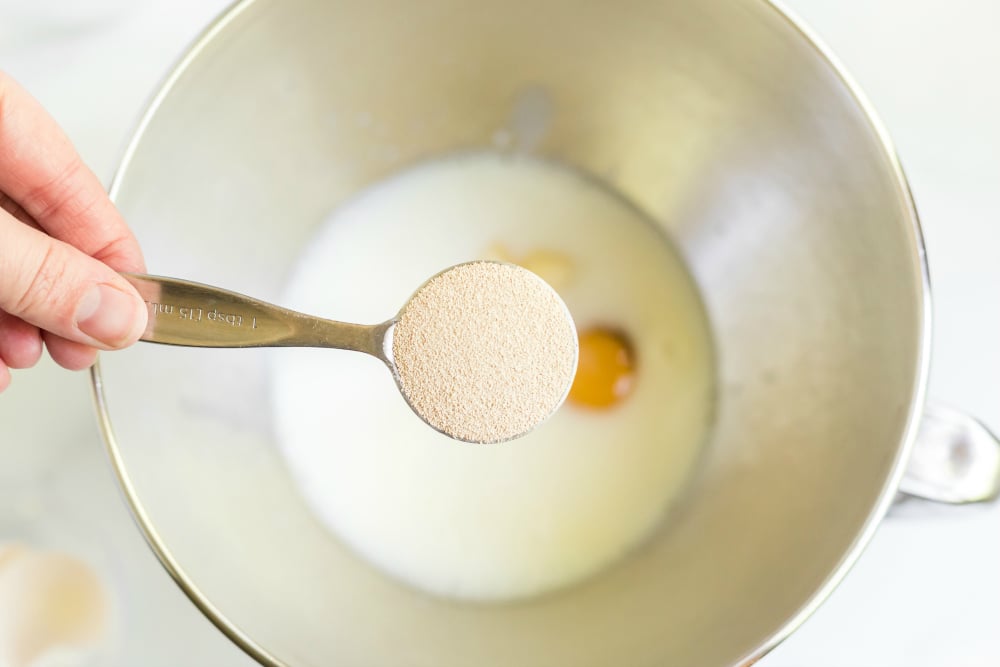 Homemade Dinner Rolls - Adding yeast to wet mixture